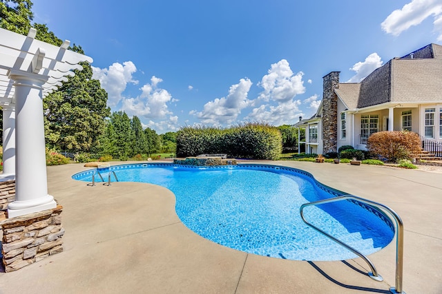 view of swimming pool featuring a patio