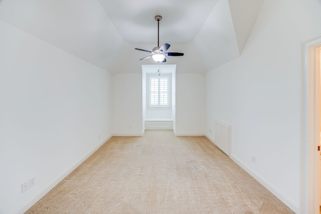 bonus room featuring vaulted ceiling, ceiling fan, and light colored carpet