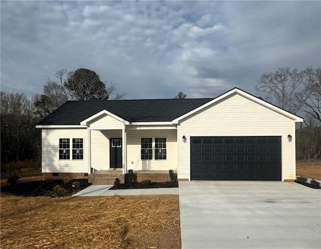 single story home with a garage, crawl space, covered porch, and driveway