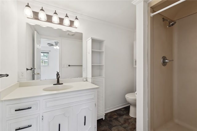 bathroom with ceiling fan, a shower, vanity, and toilet