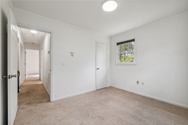 unfurnished room with light carpet and ornamental molding