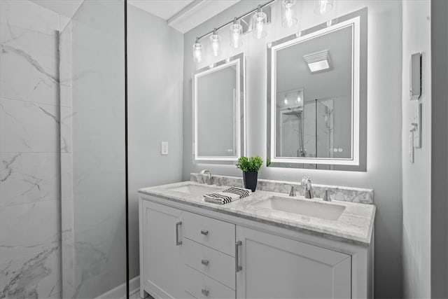 bathroom with vanity and an enclosed shower