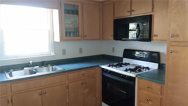157 Deerwood Dr, Westminster, SC 29693 - kitchen with glass insert cabinets, light brown cabinetry, a sink, gas stove, and black microwave