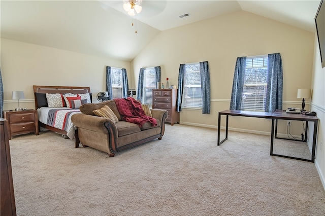 bedroom featuring lofted ceiling, light carpet, and ceiling fan