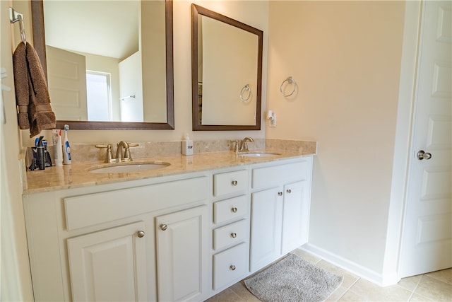 bathroom with vanity and tile patterned flooring