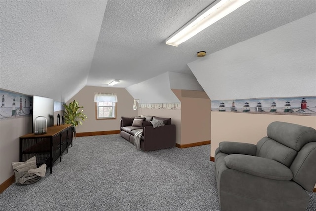 interior space featuring light carpet, vaulted ceiling, and a textured ceiling