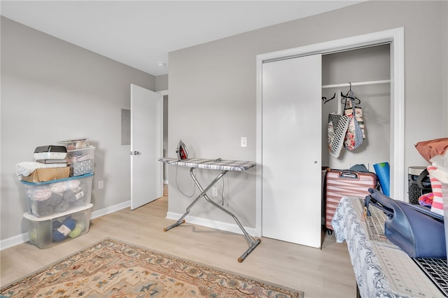 interior space featuring light hardwood / wood-style flooring and a closet