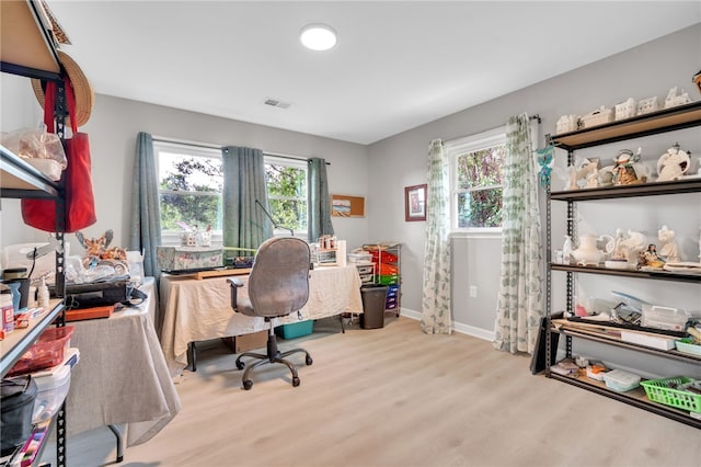 office space featuring light hardwood / wood-style flooring