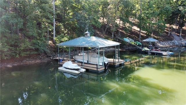 dock area featuring a water view