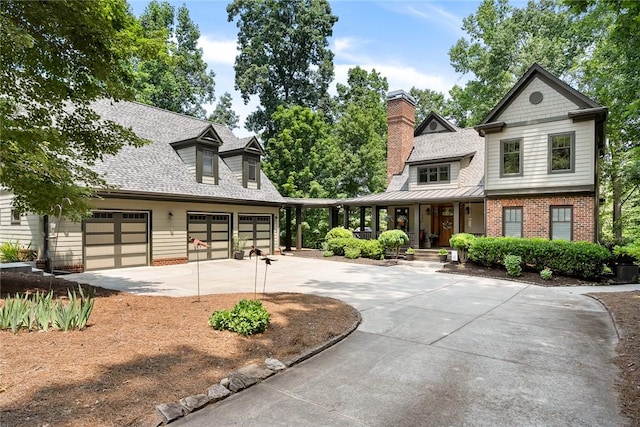 328 Grand Overlook Dr, Seneca, SC 29678 - view of front of home featuring a porch, concrete driveway, brick siding, and a shingled roof