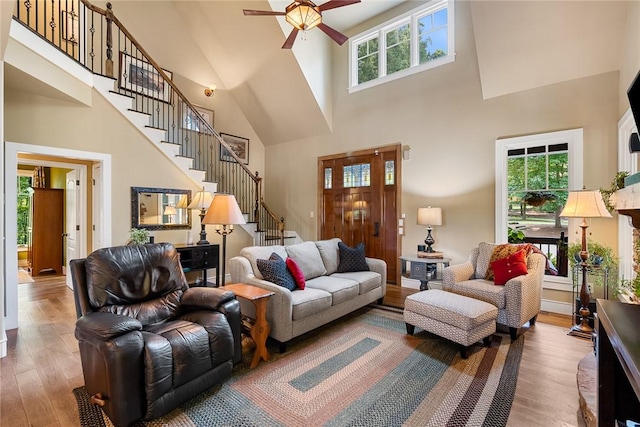 328 Grand Overlook Dr, Seneca, SC 29678 - living room with a high ceiling, stairs, wood finished floors, and ceiling fan