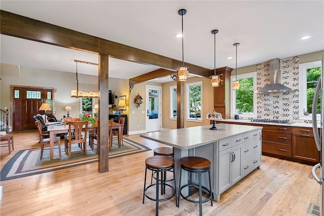 328 Grand Overlook Dr, Seneca, SC 29678 - kitchen featuring wall chimney exhaust hood, light wood-style floors, light countertops, recessed lighting, and pendant lighting