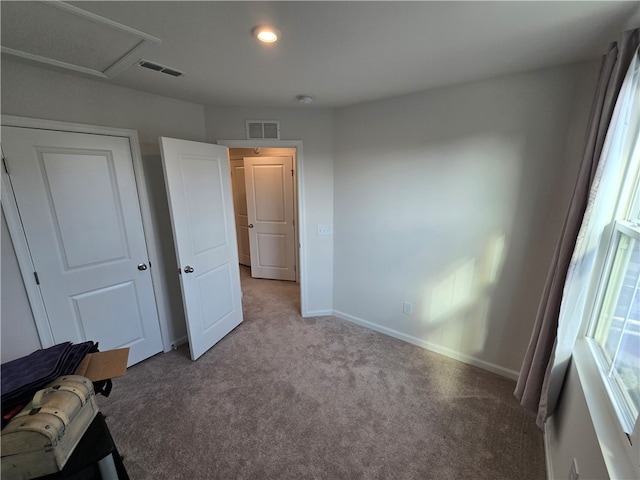 unfurnished bedroom with carpet flooring