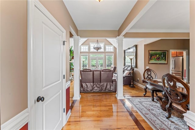516 Serria Way, Seneca, SC 29678 - entrance foyer featuring decorative columns, light wood finished floors, and baseboards