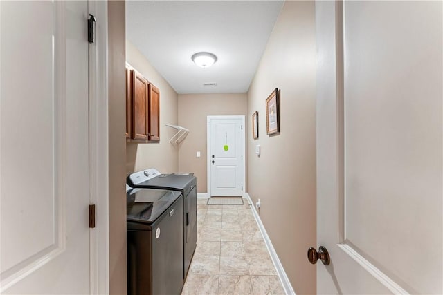 516 Serria Way, Seneca, SC 29678 - laundry room with washing machine and dryer, cabinet space, and baseboards