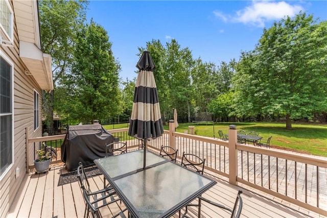 516 Serria Way, Seneca, SC 29678 - wooden terrace with outdoor dining area, a yard, area for grilling, and view of wooded area