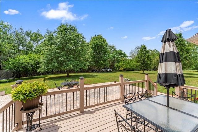 516 Serria Way, Seneca, SC 29678 - deck with outdoor dining space, a trampoline, and a yard