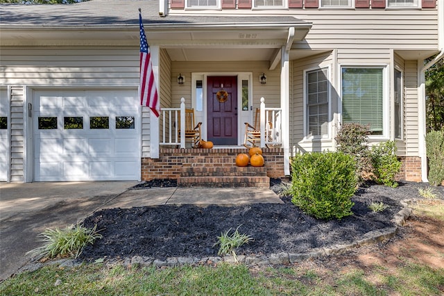 property entrance featuring a porch and a garage