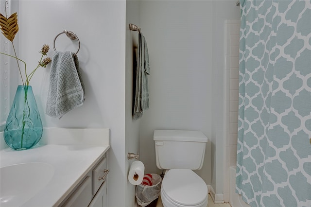 bathroom with vanity, toilet, and a shower with shower curtain