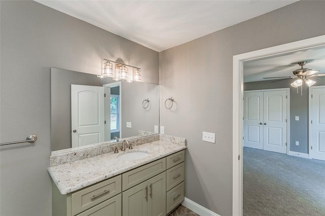 bathroom with vanity and ceiling fan