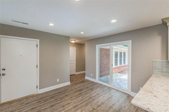 doorway featuring hardwood / wood-style floors