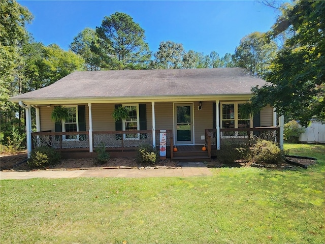 view of front of house featuring a porch and a front yard