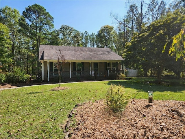 ranch-style home featuring a front yard and a porch