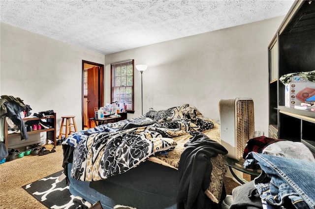 carpeted bedroom with a textured ceiling