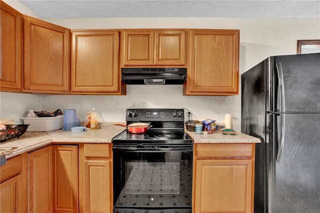 kitchen with black appliances