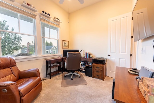 office with light colored carpet and ceiling fan