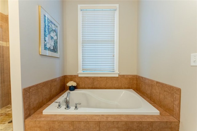 bathroom with tiled tub