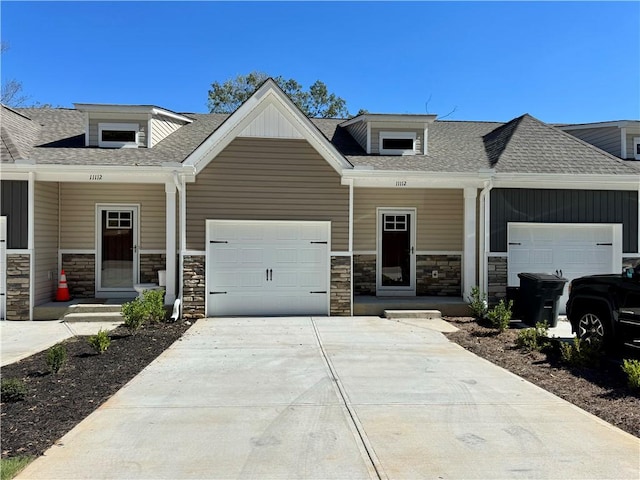 craftsman inspired home with a garage