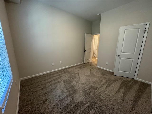 unfurnished bedroom featuring carpet flooring