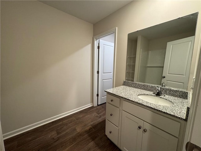 bathroom featuring wood-type flooring and vanity