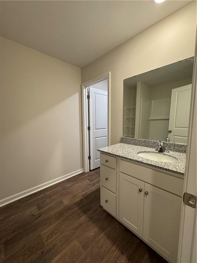 bathroom with wood-type flooring