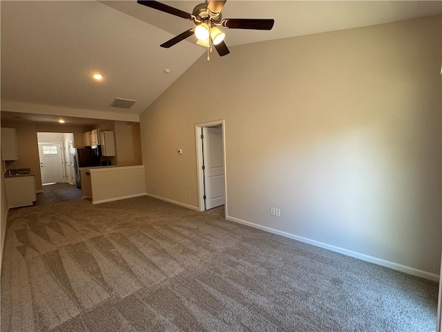 unfurnished living room featuring ceiling fan, carpet flooring, and high vaulted ceiling