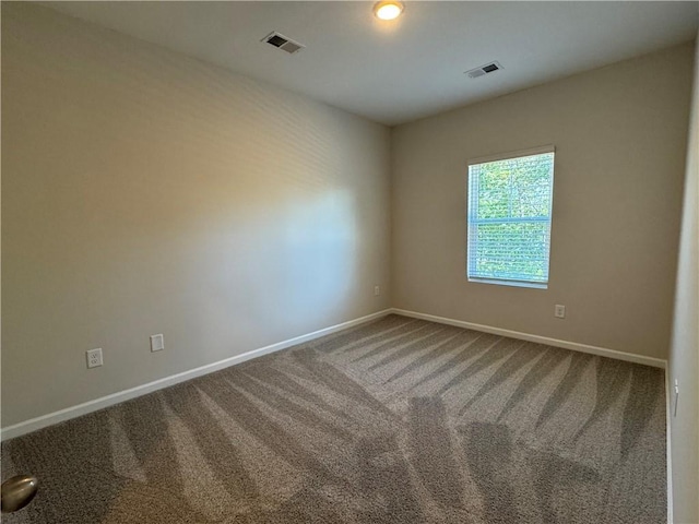 view of carpeted spare room