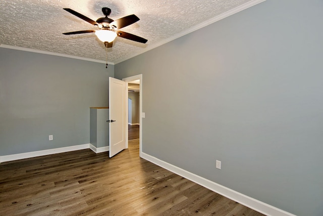 unfurnished bedroom featuring dark hardwood / wood-style floors, ornamental molding, a textured ceiling, and ceiling fan