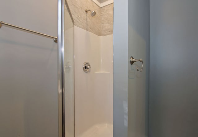 bathroom featuring an enclosed shower