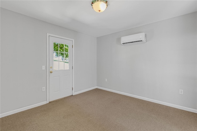 carpeted empty room with a wall unit AC