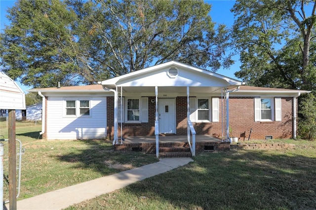 bungalow with a porch and a front lawn