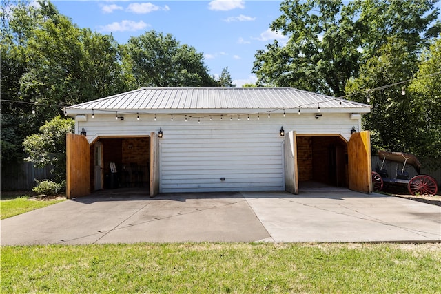 detached garage with fence