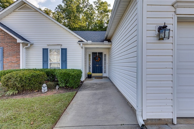 property entrance featuring a garage