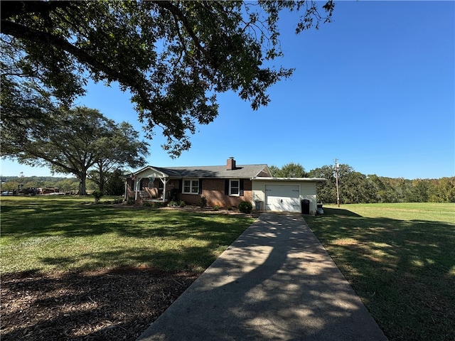 single story home with a garage and a front lawn