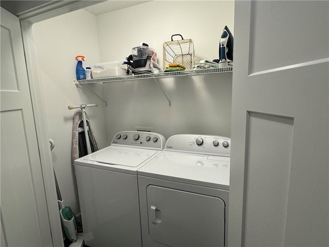 washroom with washer and clothes dryer