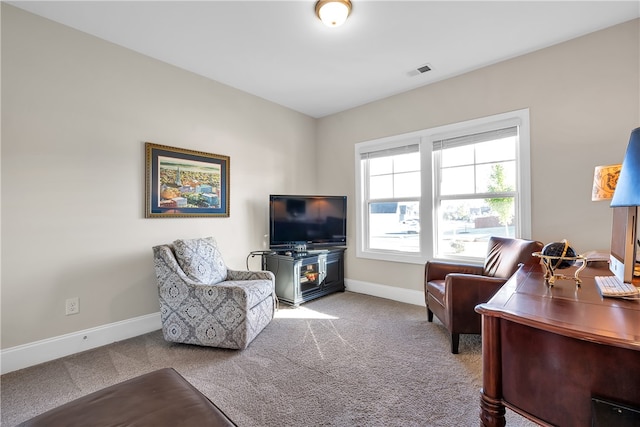 living room with light colored carpet