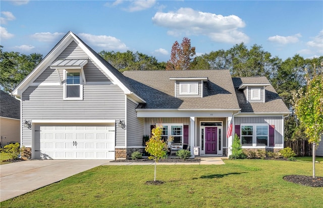 view of front facade featuring a front lawn and a garage