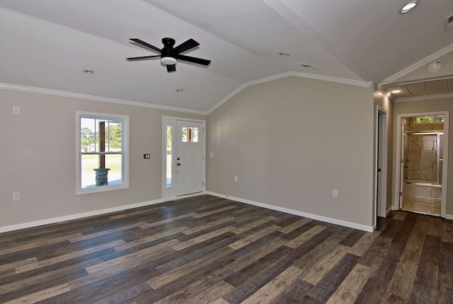 unfurnished living room with crown molding, lofted ceiling, dark hardwood / wood-style floors, and ceiling fan