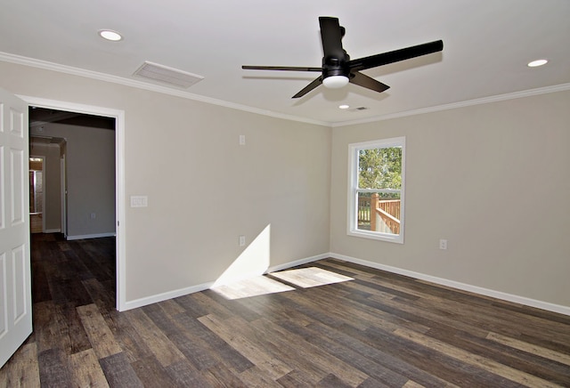 spare room featuring crown molding, dark wood-type flooring, and ceiling fan