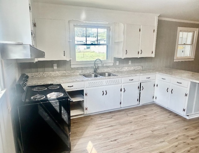 kitchen featuring black electric range oven, ventilation hood, sink, light wood-type flooring, and white cabinetry